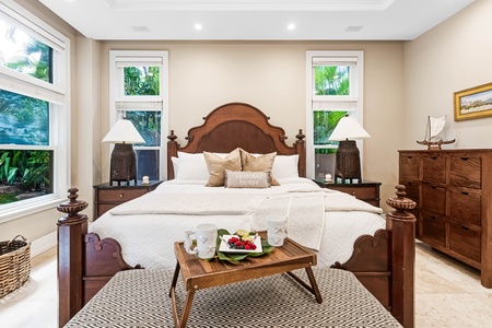 Guest suite with classic wood furnishings and peaceful ambiance.