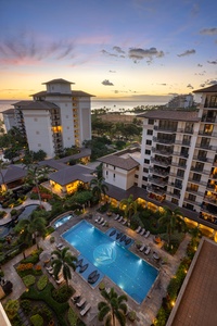 Twilight aerial shot of the pool.