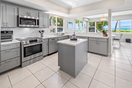 Spacious open-concept living room with ocean views and seamless indoor-outdoor flow.