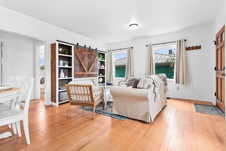 Gather with friends or family in this light-filled living room featuring soft textures and smart home touches.