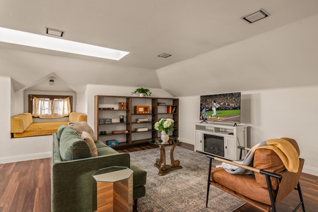 Cozy den for movie nights and relaxed gatherings.