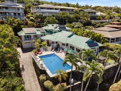Honu Hale perched above the Kona coast with pool lanai and panoramic ocean views.