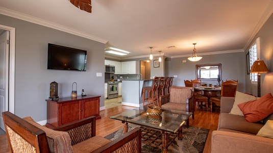 The open floor plan for the kitchen, living and dining room.