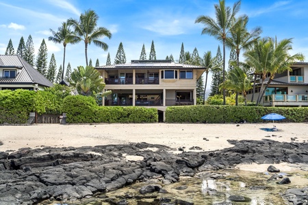 Oceanfront lanai with plush seating and panoramic views—perfect for morning coffee or sunset cocktails.