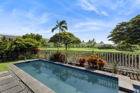 Soak up mountain views while you unwind poolside at Kona Blue Vacations Holua Kai, your island escape.
