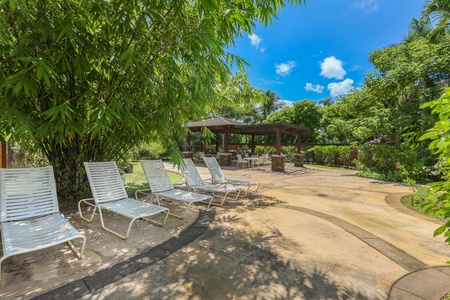 Strolling the grounds of Waikomo Streams Villa in Poipu is like walking through a fairy tale.