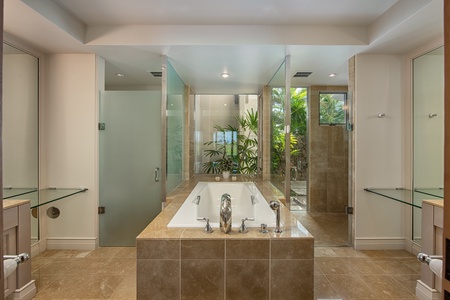 Relaxing primary bath with dual sinks and dual vanity spaces