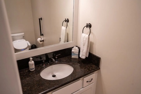 Bathroom off of the home theater so you don't miss too much of the movie!