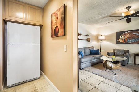 Kitchen and the welcoming living area perfect for relaxing or entertaining.