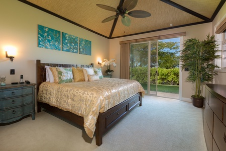 Primary bedroom has beautiful views of the Kohala Mountains