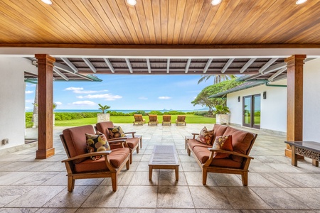 Retreat to luxury on the covered lanai overlooking Kailua Bay and the iconic Mokulua Islands.