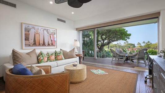 The primary suite is conveniently located right off this family den.