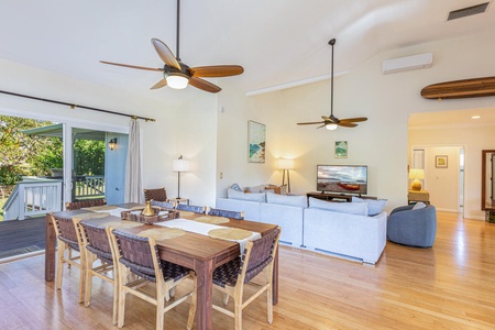Seamless flow from living to dining to kitchen.