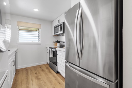 A full-size fridge, microwave, and washer/dryer combo make your extended stay comfortable and convenient.