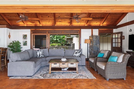 Spacious living room with a view, ideal for movie nights or morning coffee.