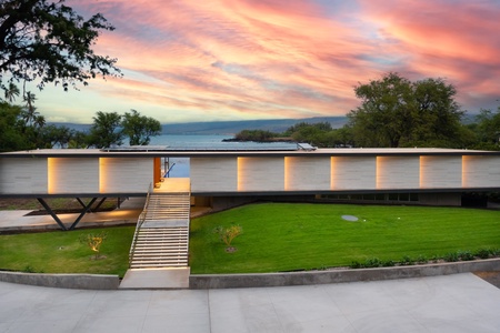 The perfect modern home with offers expansive lawn, and seamless indoor-outdoor flow.