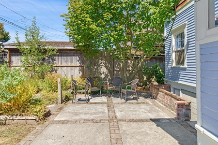 The custom tiled porch and stairs add a touch of sophistication to this outdoor oasis.