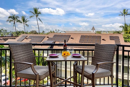 Chic decor and tropical vibes in a living space that opens to ocean breezes on the lanai.