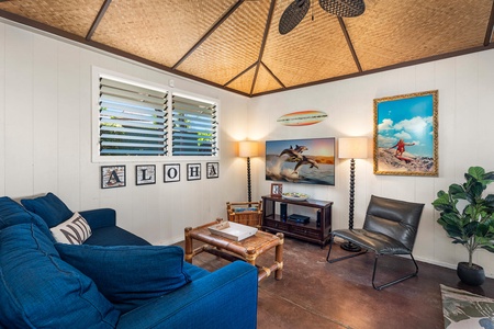 Cozy living area with coastal décor and a Smart TV for relaxed movie nights.