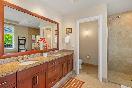 Dual sink vanity area so everyone has a space.