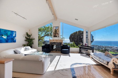 Open Living Room with fireplace and electric piano