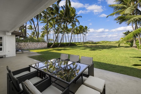 Enjoy some time in the shaded outdoor seating area with gorgeous tropical views