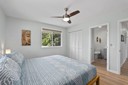 Enjoy the serene comfort of this stylish bedroom, featuring calming decor and thoughtful amenities.