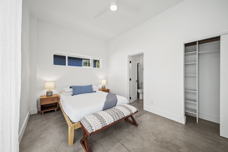 This guest suite located downstairs has an ensuite bathroom for added privacy.