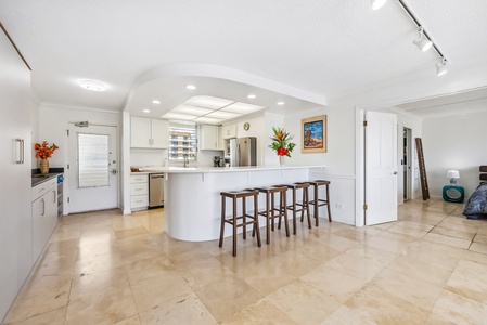 Chic dining nook with stylish furnishings for intimate meals and serene moments.