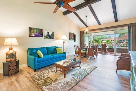 Tropical touches and a cozy blue sofa bring Maui Kaanapali Villas 292’s chill vibe to life.