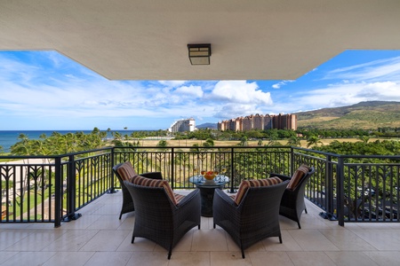 The lagoon pool is an enchanting retreat with swaying palm trees and vibrant island scenery at Beach Villas at Ko Olina.