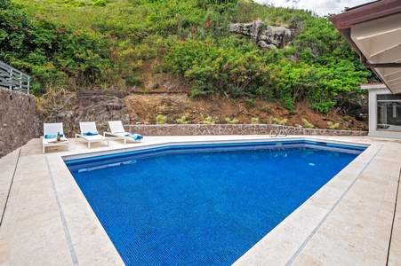 Unwind poolside in your private hillside haven surrounded by nature.