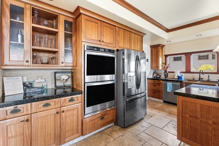 Bonus kitchen view featuring double ovens, wine storage, and generous cabinetry—ready for large groups or chef service.