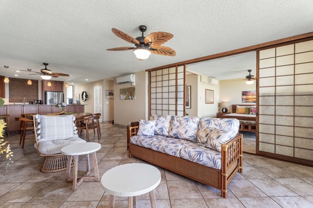 Retreat in the living area with Elegant Japanese-themed suite doors open.