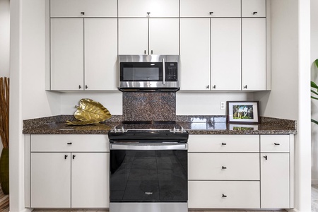 A roomy kitchen space is the chef's delight.