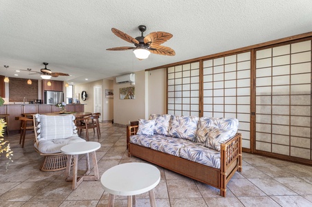 Retreat in the living area with plush couches and occasional seats.