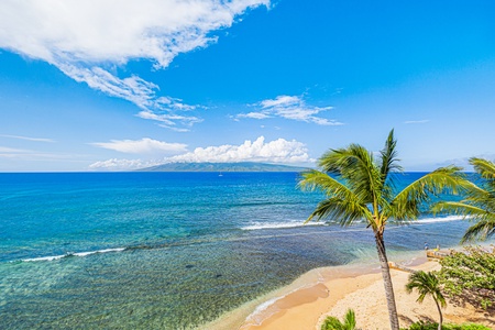 Take in the stunning panoramic views of the ocean and nearby islands, a perfect backdrop for a day of relaxation by the shore.