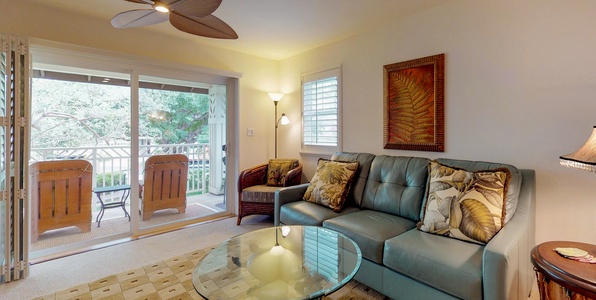 Cozy living space with plush seating and access to a peaceful lanai.
