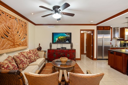 The beautifully decorated living area with TV is right off the dining area.