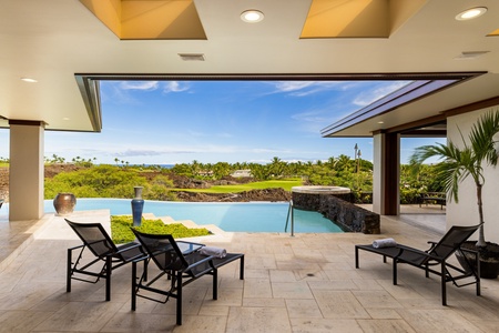 Lounge poolside or soak in the elevated spa with panoramic views of the Pacific and Mauna Lani fairways.