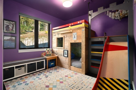 Your kids will love this magical playroom with a castle bunk bed, colorful slides, and plenty of space for adventures and imagination to run wild.