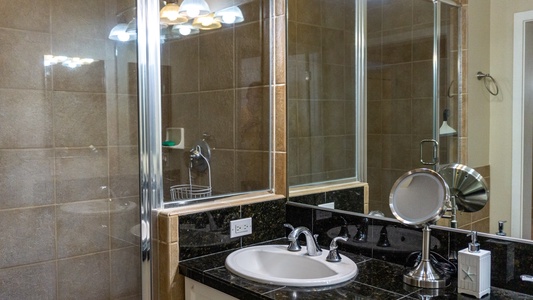 The primary guest bathroom with a walk-in shower.