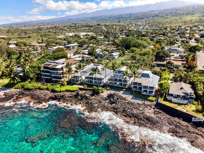 Bird’s-eye view of the complex nestled along the scenic Kona coastline.