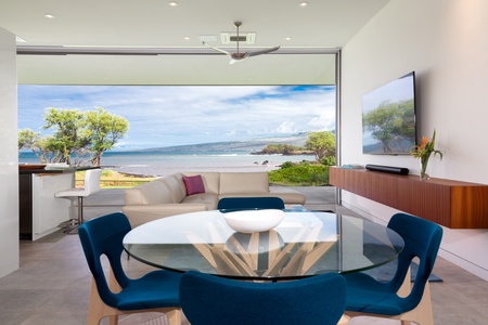 Relax in this cozy lounge area with an ocean-view, ideal for breakfast or games.