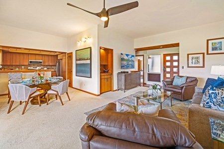 The open living and dining space at Kapalua Ridge 2321 offers a welcoming spot to relax or entertain.