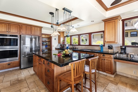 Top-tier appliances and granite countertops—this kitchen is both functional and beautiful.
