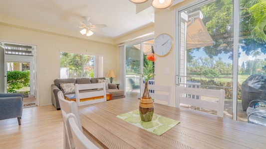 Gather with family or friends at the dining table for six, filled with natural light and garden views.