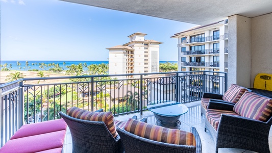 The kitchen is equipped with stainless steel appliances and ocean views.