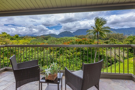 Relax on the lanai and enjoy the lush garden views with mountain peaks in the distance.