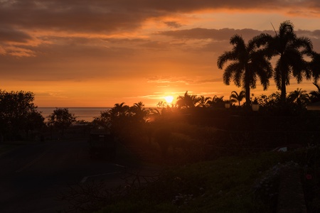 Golden hour views paint the horizon with tropical beauty.